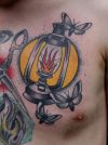 lamp tattoo on chest